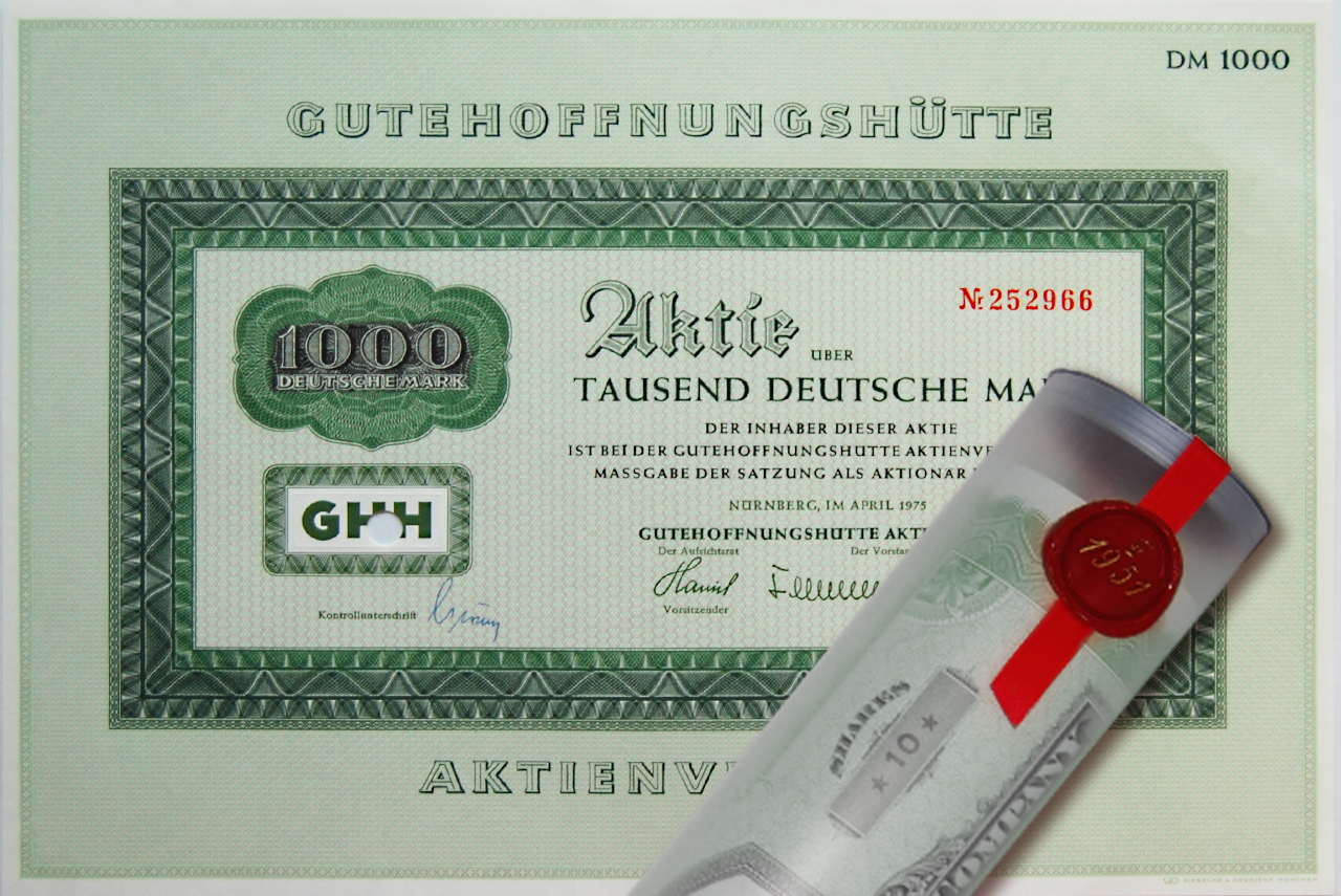 Aktie 1975 Gutehoffnungshütte in edler Geschenkrolle